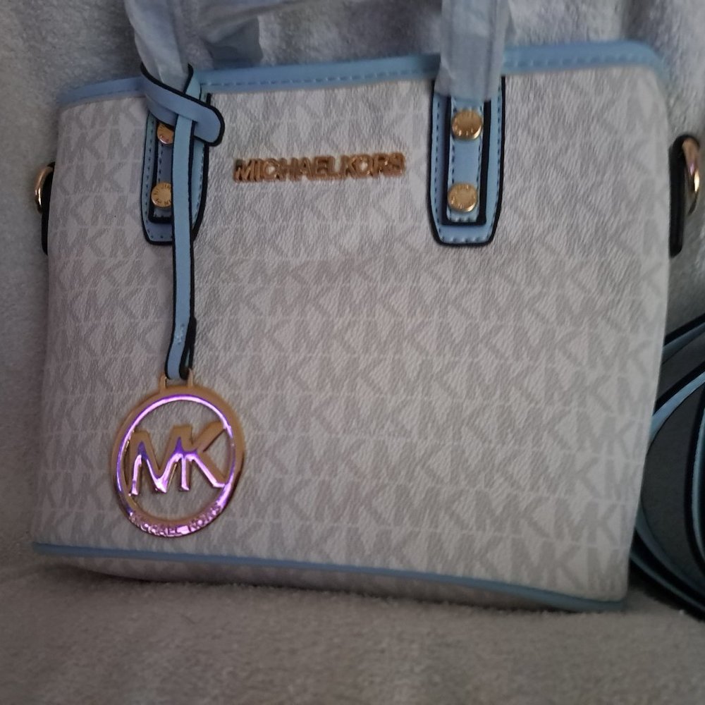 New, small, blue Michael Kors Bag